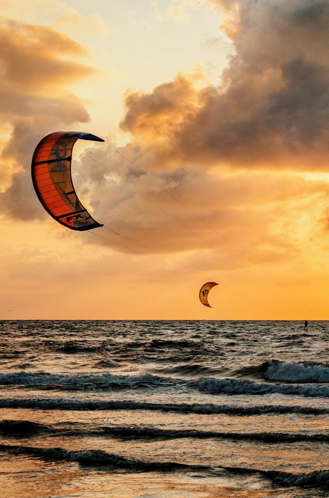 Kite surfing at sunrise in Valencia